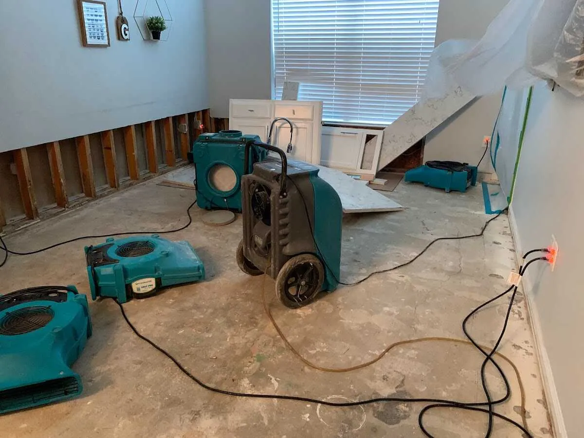 Dehumidifier in flood-cut room for Water Damage Restoration in Rainbow City